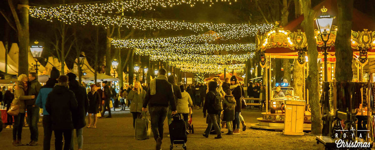 People chatting at the Royal Christmas Fair in The Hague